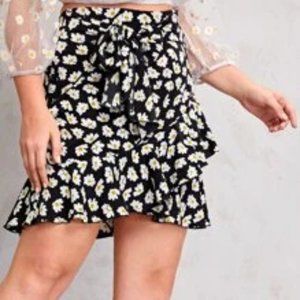 Black mini skirt with daisy print 3 for $20